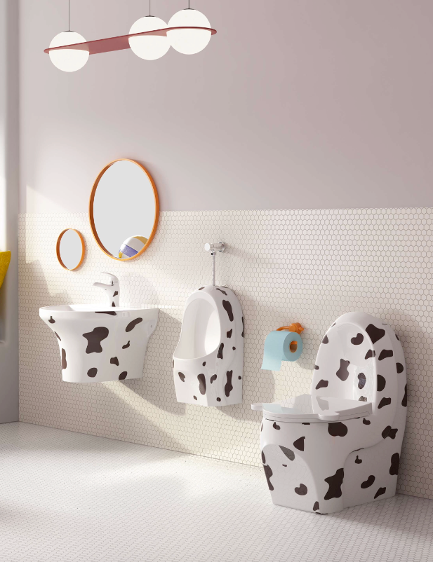 Bathroom with white toilet and sink featuring black spotted design, light gray walls, and round pendant lights. Jimmy jnr kids bathrooms, Stonebaths.